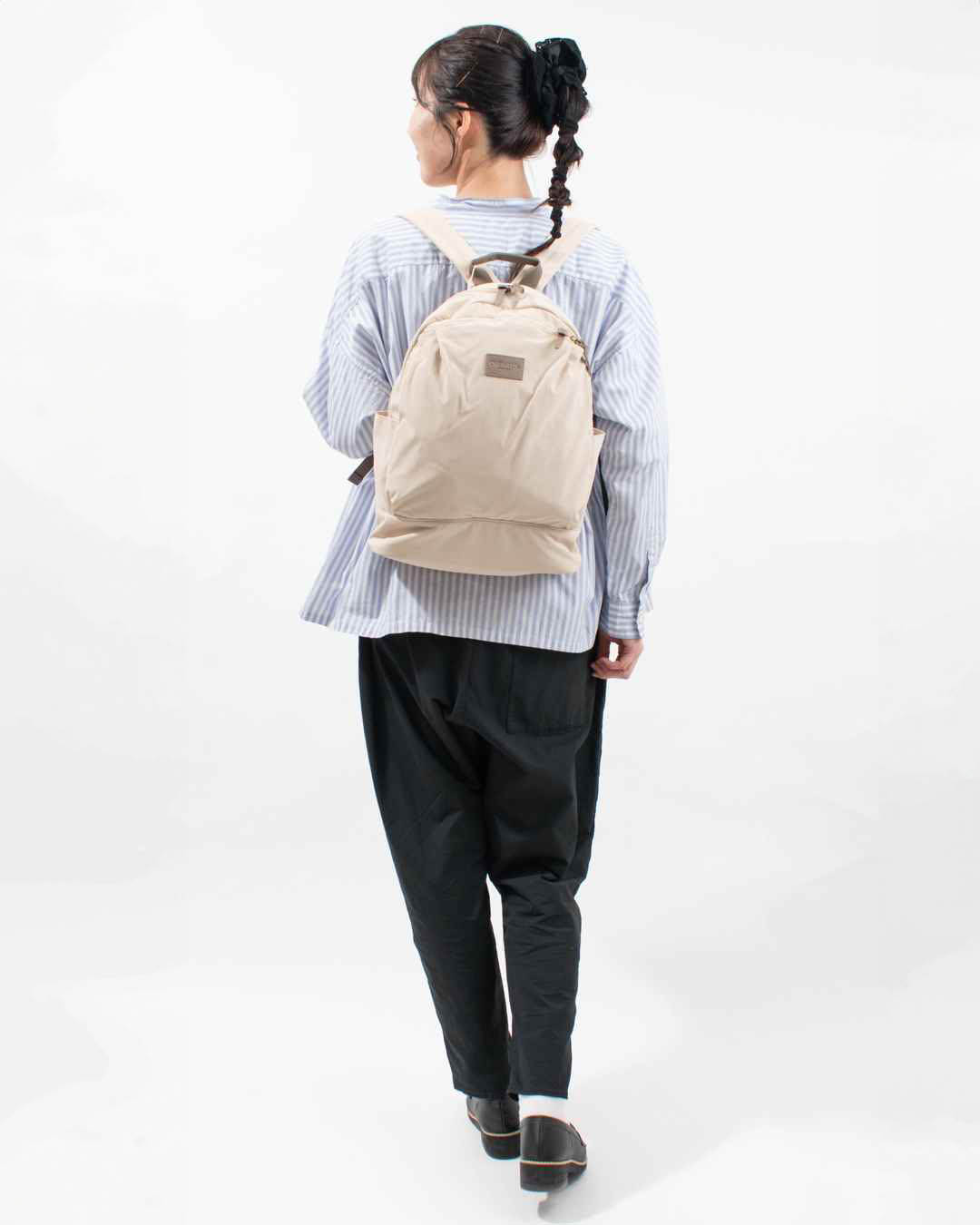 51111  ONEPAIRED/toleur ウォッシュナイロンフロントポケットリュック